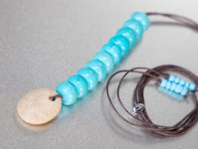 Load image into Gallery viewer, Beach Stone and Turquoise 10 Breaths Necklace
