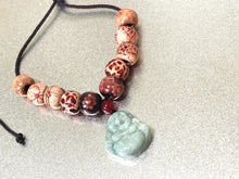 Load image into Gallery viewer, 10 Breaths Necklace with Jade Buddha Charm and Decorative Wood Beads
